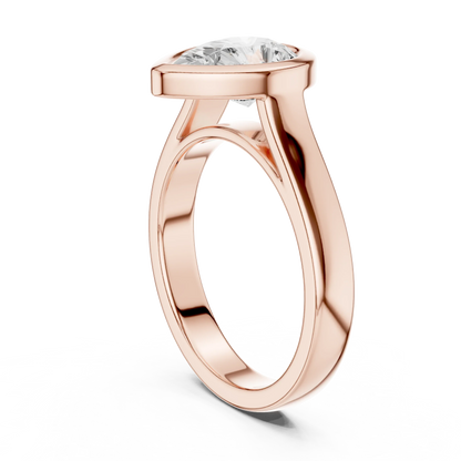 Back view of rose gold pear full bezel solitaire ring with wide flat band and lab-grown diamond – Australia