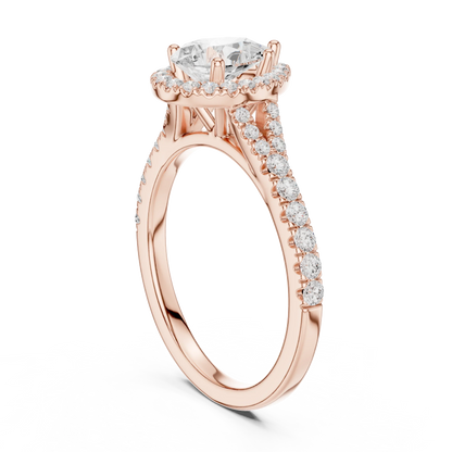 Back side view of rose gold pear halo ring showing pav茅 split shank band and setting details