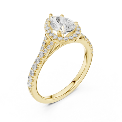 Front view of yellow gold pear halo ring with pav茅 split shank band and center diamond