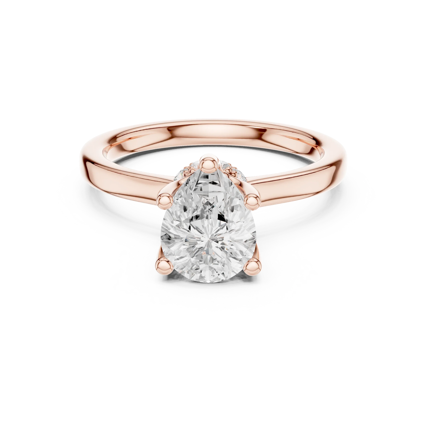 Rose gold pear cut solitaire ring with hidden halo and domed band featuring lab-grown diamond, modern look