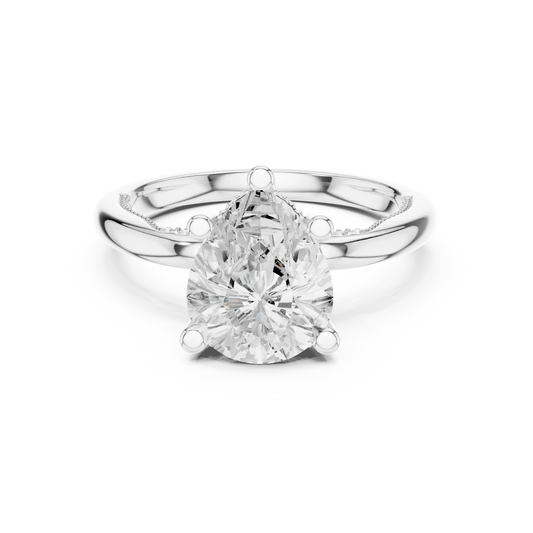 White gold pear cut solitaire ring with hidden halo and domed band featuring lab-grown diamond, elegant design
