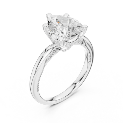 Front view of white gold pear cut solitaire ring with hidden halo and domed band and lab-created diamond