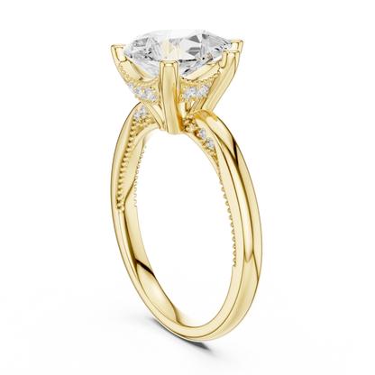 Back side view of yellow gold pear cut solitaire ring showing hidden halo and domed band details