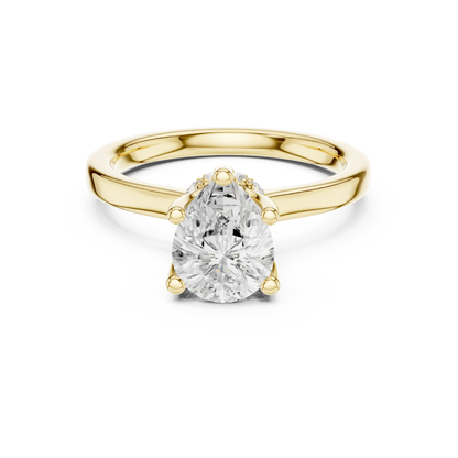Yellow gold pear cut solitaire ring with hidden halo and domed band featuring lab-grown diamond, classic style