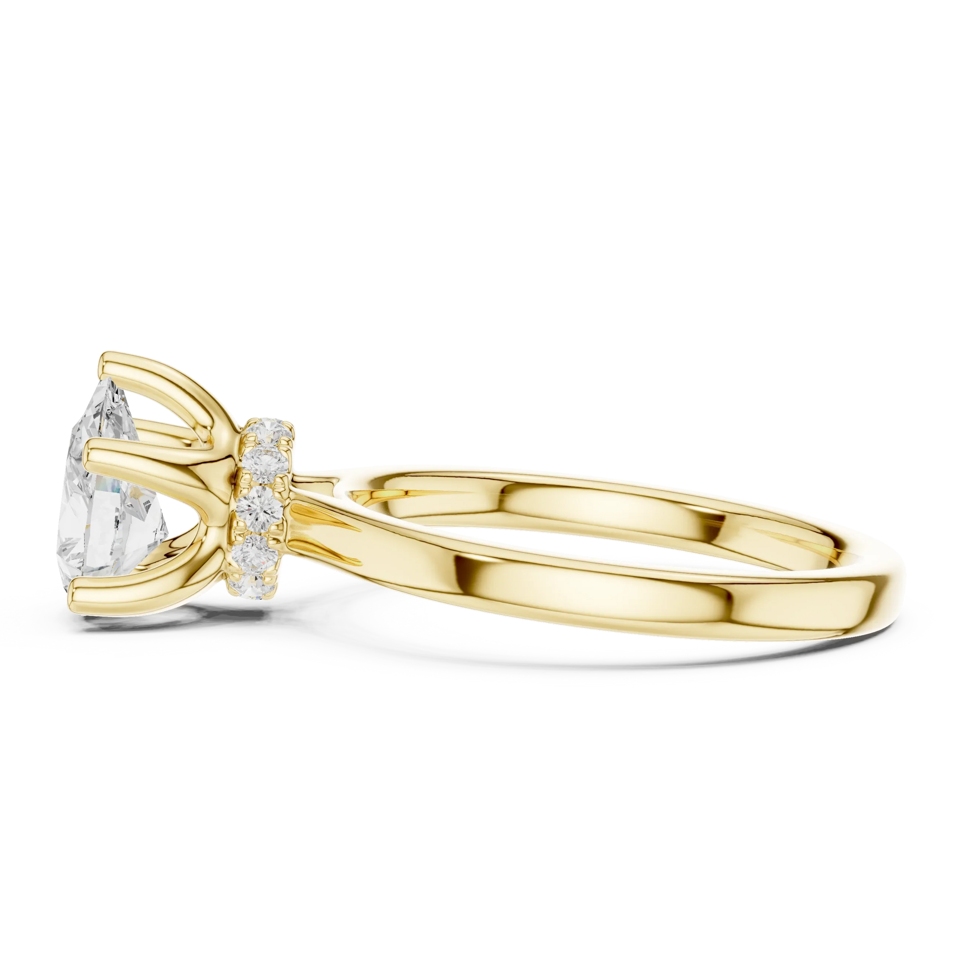 Side view of yellow gold pear cut solitaire ring highlighting hidden halo and domed band design