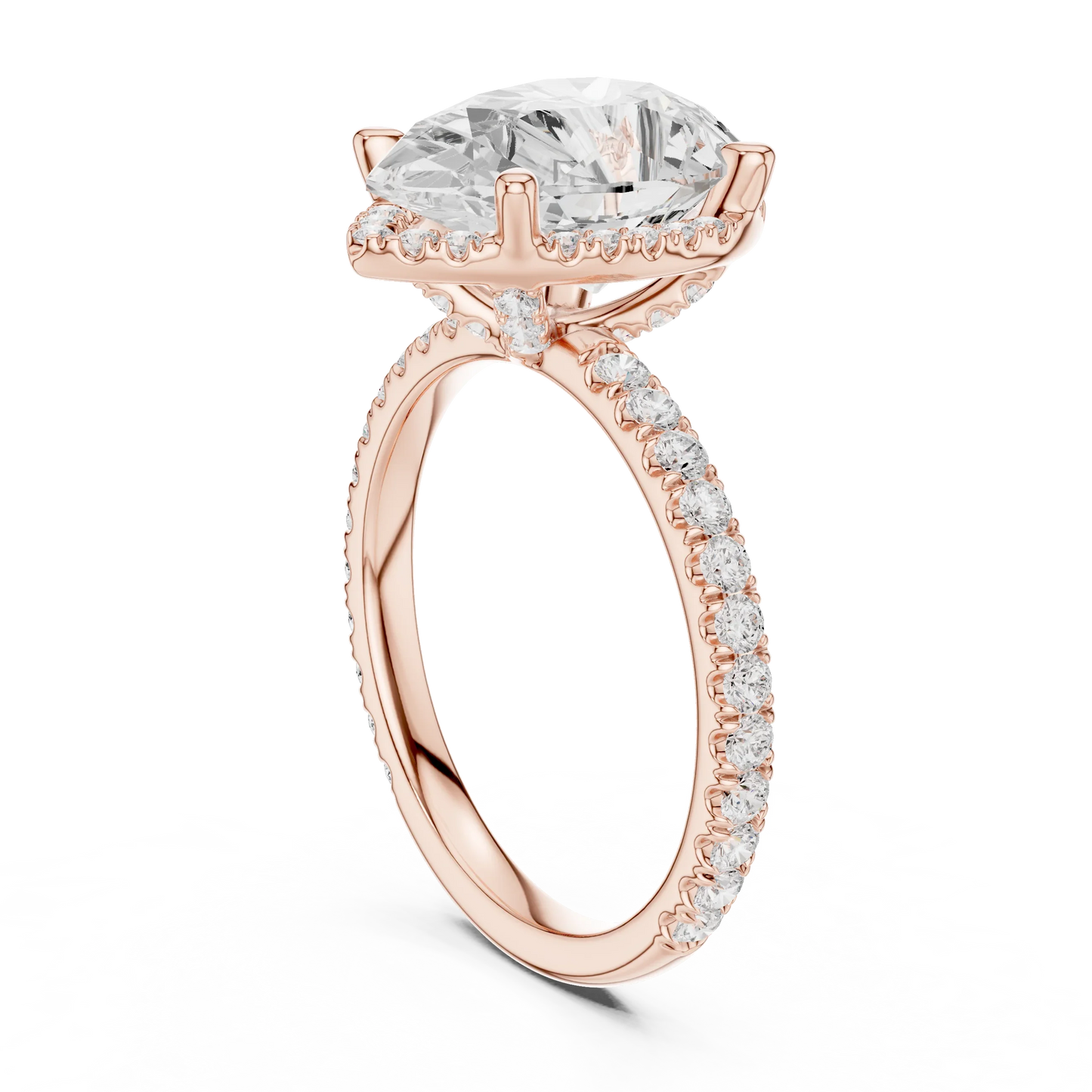 Back side view of rose gold pear cut solitaire ring showing hidden halo and thin pav茅 band structure