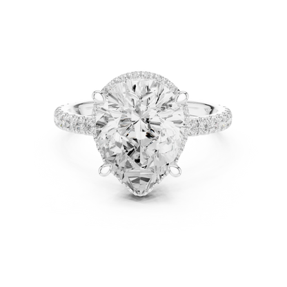 White gold pear cut solitaire ring with hidden halo and thin pav茅 band featuring lab-grown diamond, delicate design