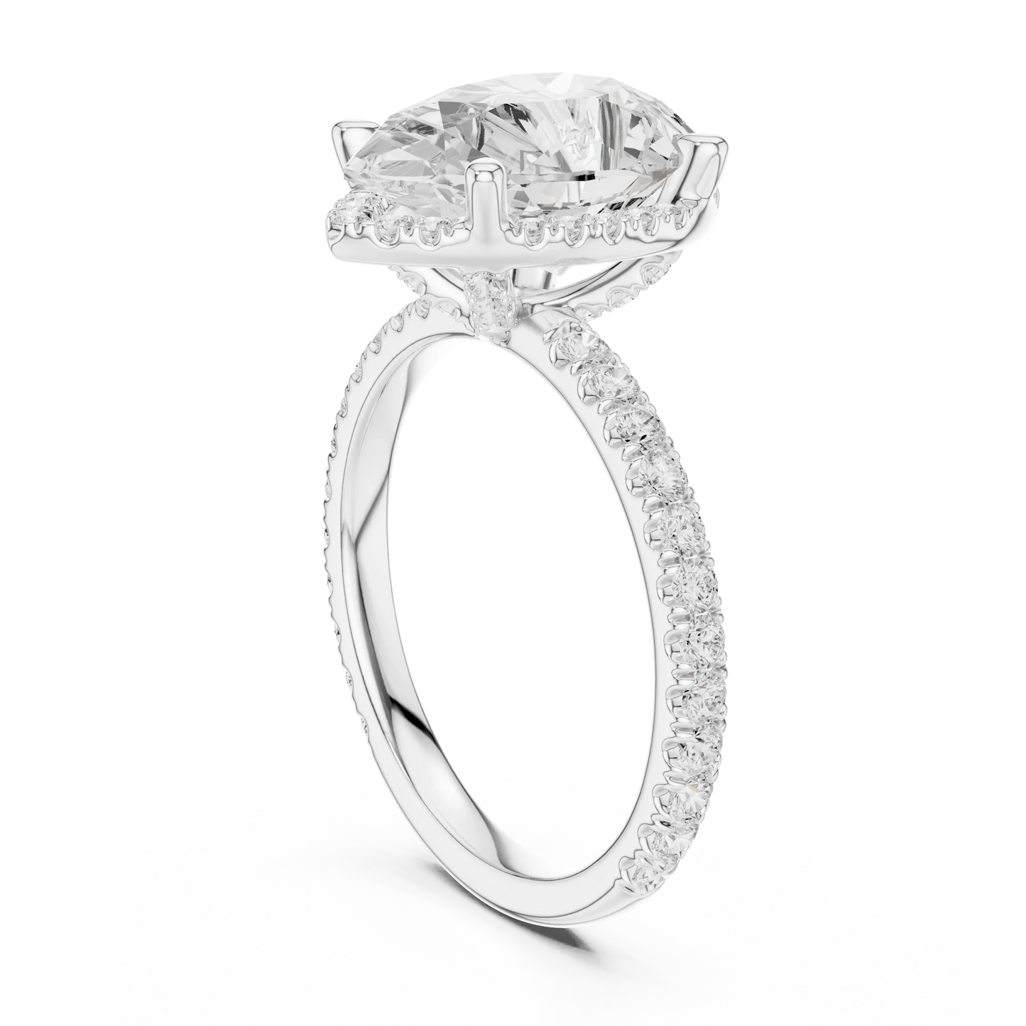 Back side view of white gold pear cut solitaire ring showing hidden halo and thin pav茅 band details