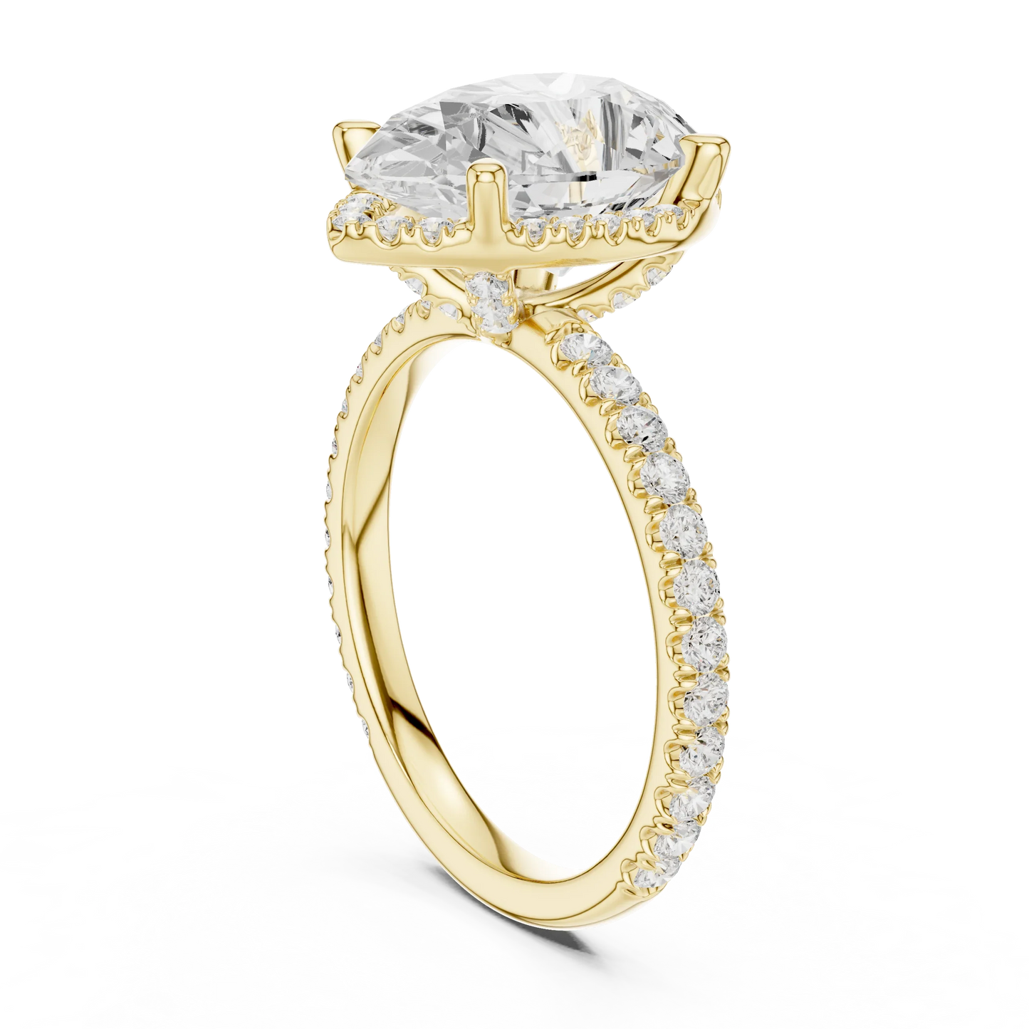 Back side view of yellow gold pear cut solitaire ring showing hidden halo and thin pav茅 band details