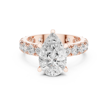 Rose gold pear cut solitaire ring with pave band and lab-grown diamond, modern look