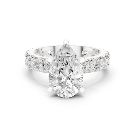 White gold pear cut solitaire ring with pave band and lab-grown diamond, elegant design