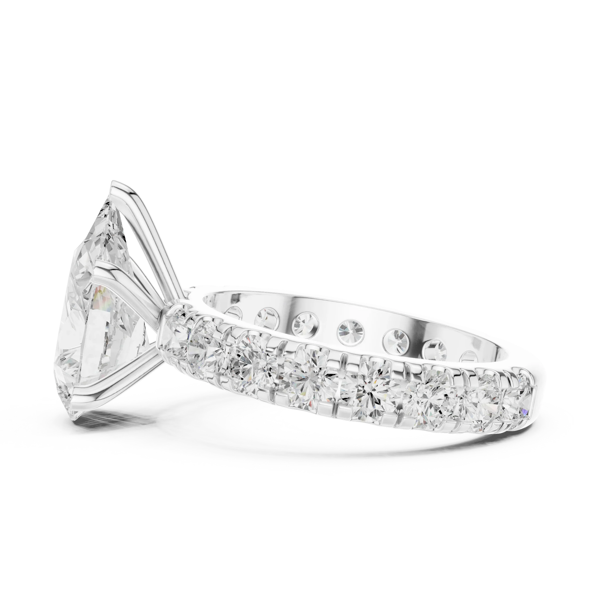 Side view of white gold pear cut solitaire ring highlighting pave band and prong setting