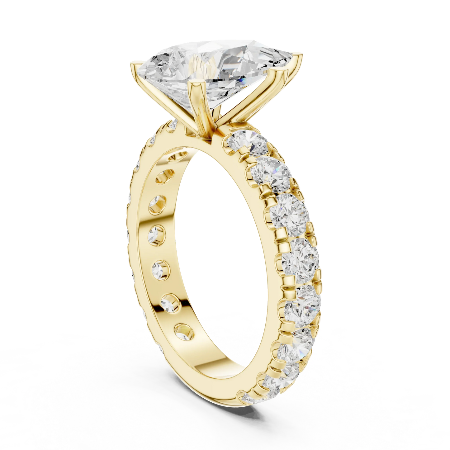 Back side view of yellow gold pear cut solitaire ring showing pave band and mounting details
