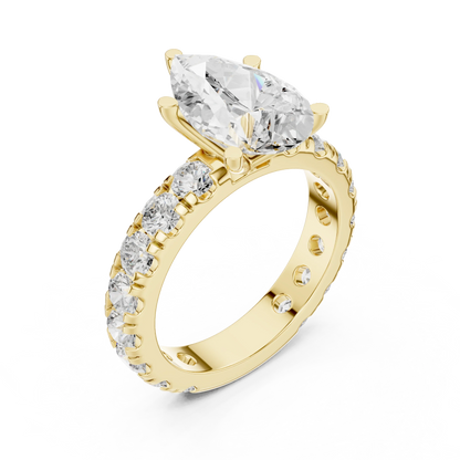 Front view of yellow gold pear cut solitaire ring with pave band and lab-created diamond
