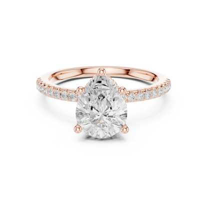 Rose gold pear cut solitaire ring with thin pave band and lab-grown diamond, modern delicate look