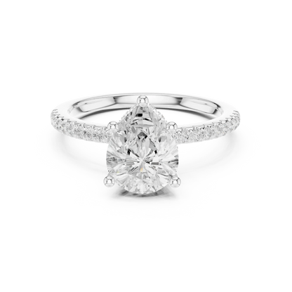White gold pear cut solitaire ring with thin pave band and lab-grown diamond, delicate design
