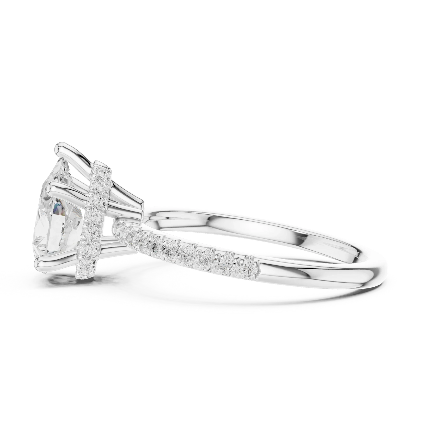 Side view of white gold pear cut solitaire ring highlighting thin pave band and prong setting