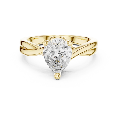 Lab-grown pear cut solitaire ring in yellow gold with twisted band design