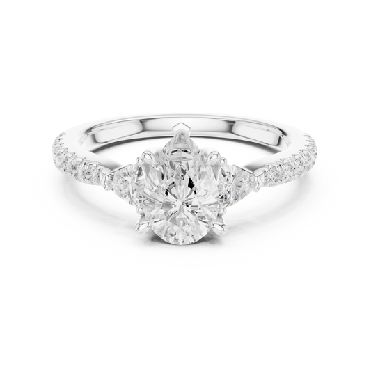 Lab-grown pear cut three stone diamond ring with half moon side stones and pave band in white gold, top view.