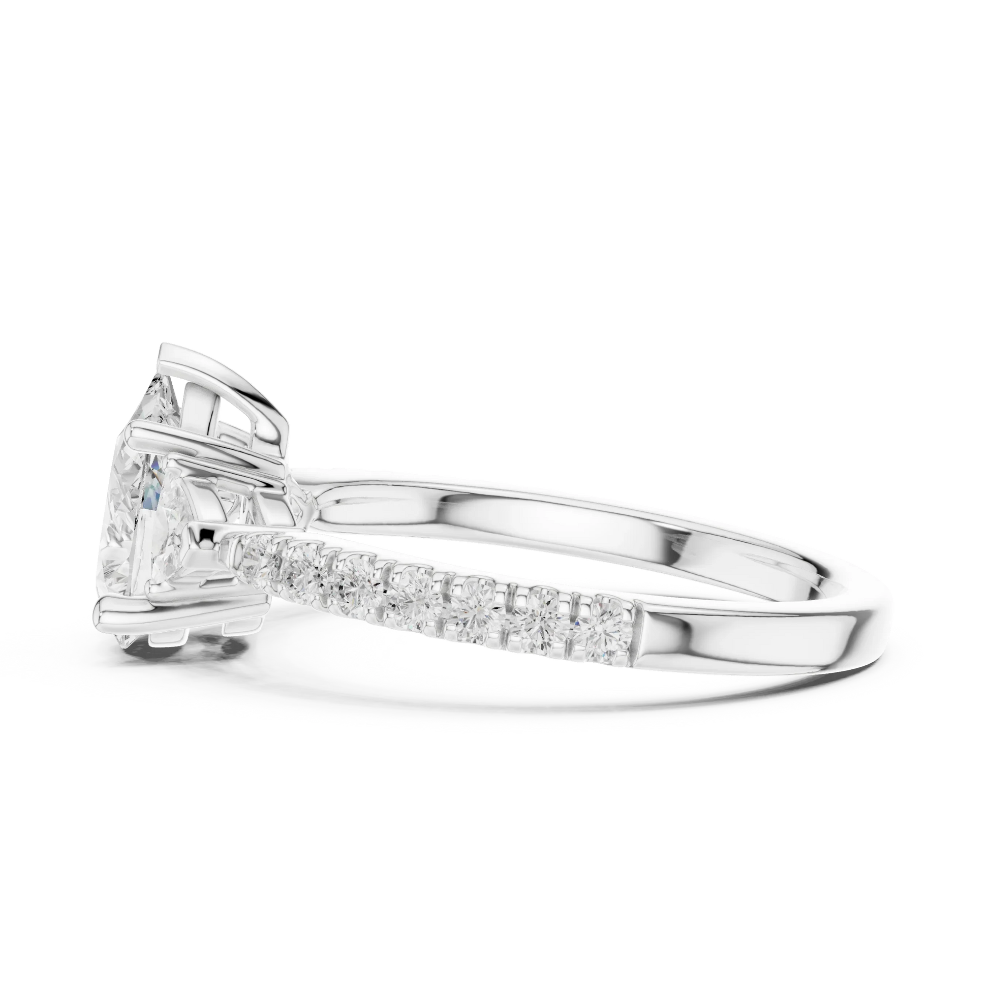 Side view of white gold pear three stone diamond ring with half moon side stones and pave band, highlighting setting profile.
