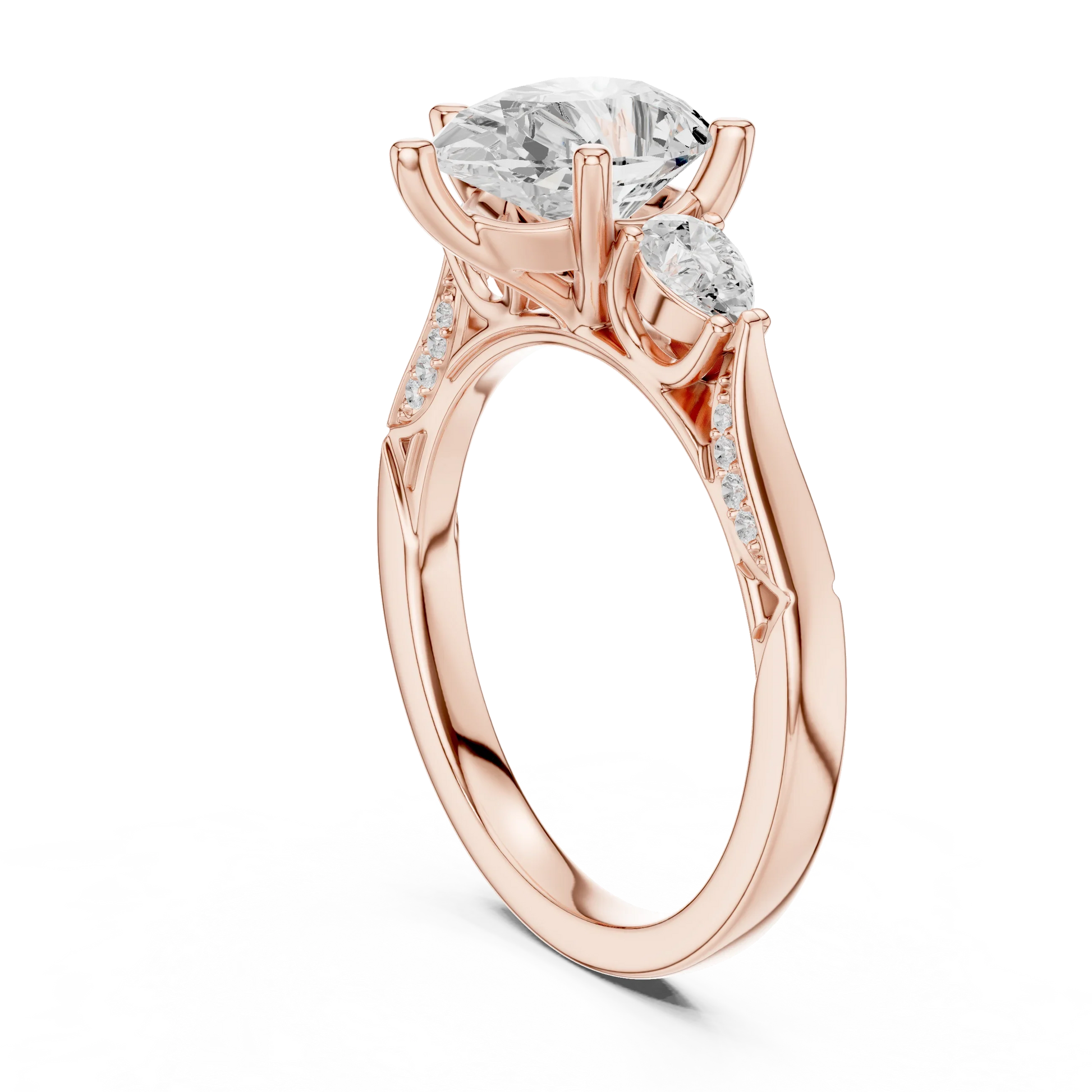 Back side view of rose gold pear three stone ring with pear side stones, accent band and lab-grown diamonds 鈥?Australia