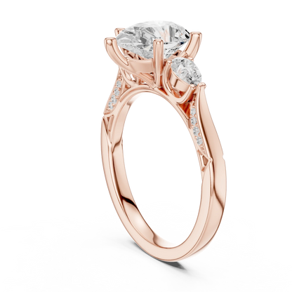 Back side view of rose gold pear three stone ring with pear side stones, accent band and lab-grown diamonds 鈥?Australia