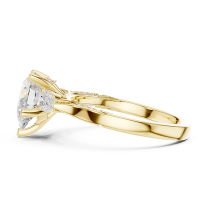 Side view of yellow gold pear three stone ring with pear side stones, accent band and lab-grown diamonds 鈥?Australia