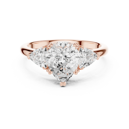 Pear three-stone ring in rose gold with trillion cut side stones and lab-grown diamond 鈥?Australia