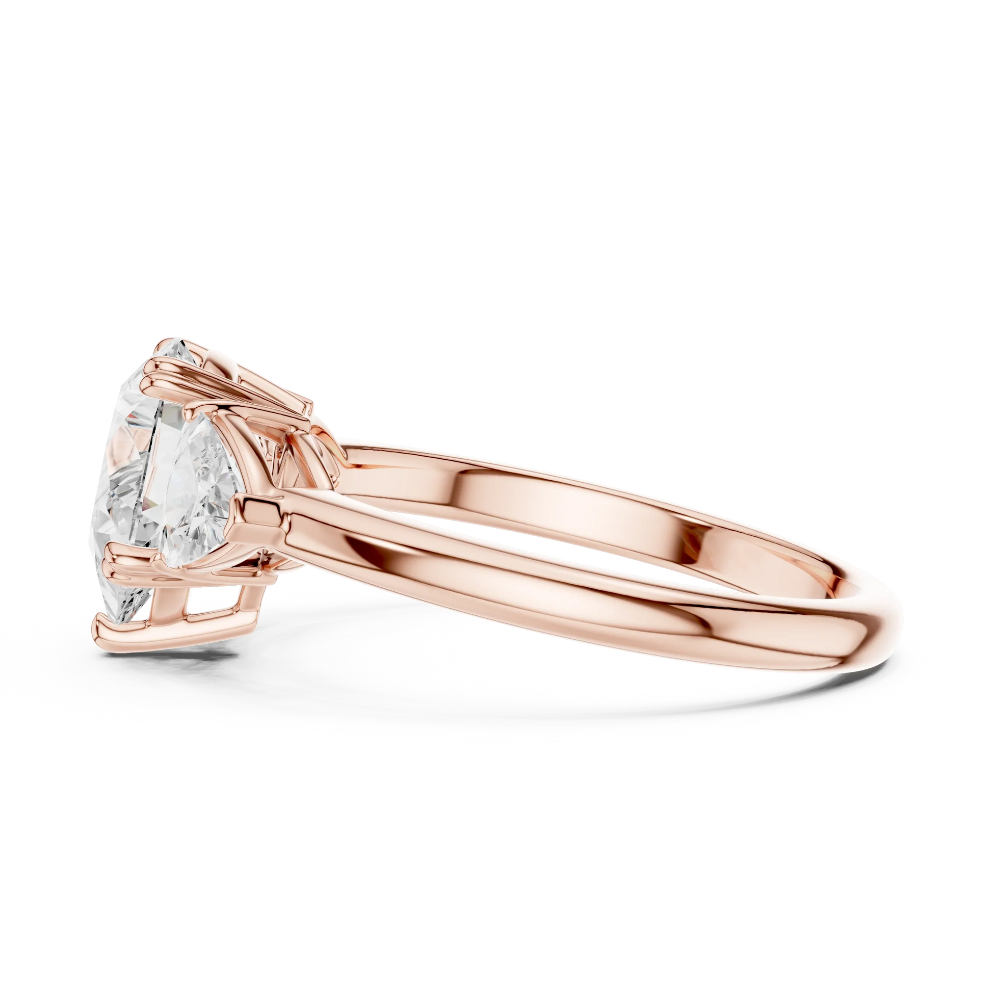 Side view of rose gold pear three-stone ring with trillion cut side stones and lab-grown diamond 鈥?Australia