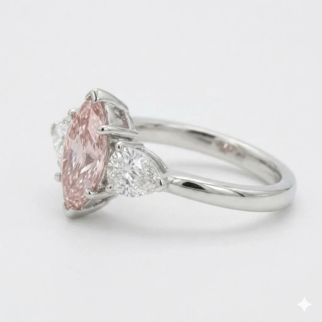 Side view of pink marquise cut three stone diamond ring with pear side stones in white gold with lab-grown diamonds – Australia