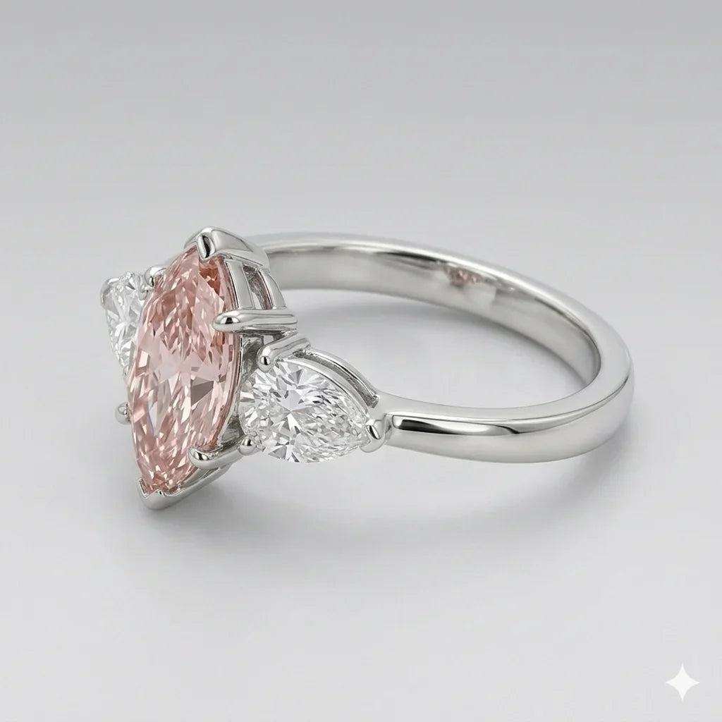 Side view of pink marquise cut three stone diamond ring with pear side stones in white gold with lab-grown diamonds – Australia