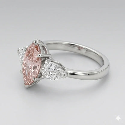 Side view of pink marquise cut three stone diamond ring with pear side stones in white gold with lab-grown diamonds – Australia