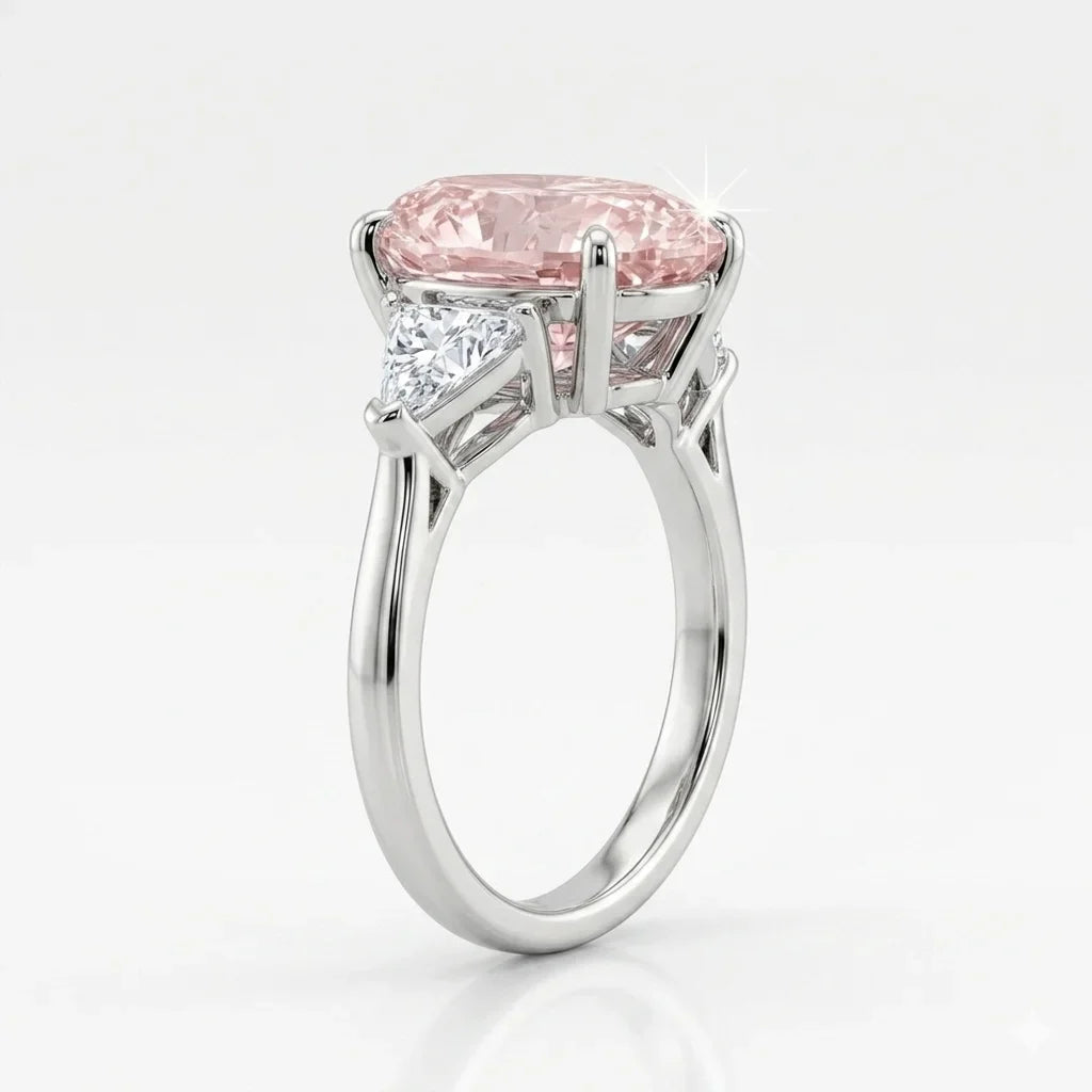 Side view of white gold pink oval diamond three stone ring with trillion side stones and lab-grown diamonds – Australia
