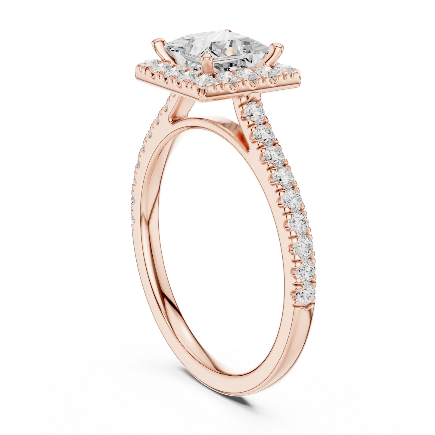 Top view of a rose gold princess halo ring with a pav茅 diamond band and lab-grown center stone