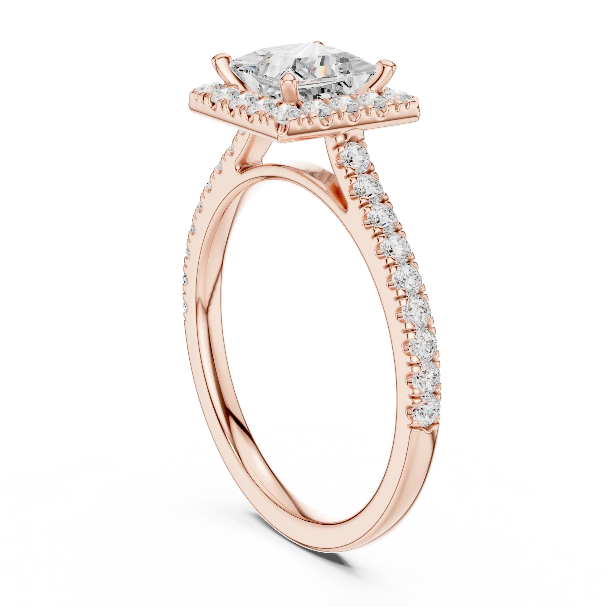 Top view of a rose gold princess halo ring with a pav茅 diamond band and lab-grown center stone