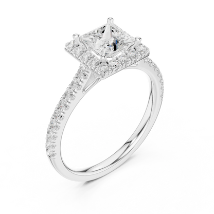 Top view of white gold princess-cut halo ring with pav茅 diamond band and lab-grown center stone