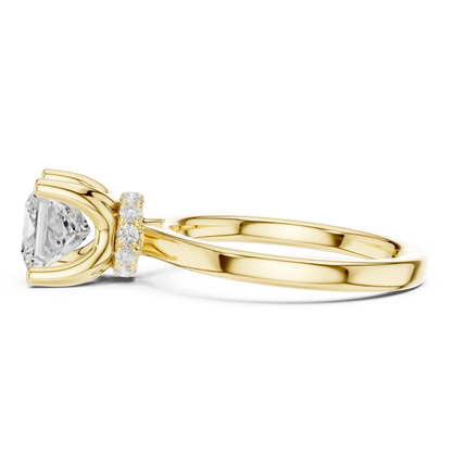 Side view of yellow gold princess cut solitaire ring highlighting hidden halo and domed band design