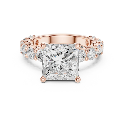 Lab-grown princess cut solitaire ring in rose gold with shared prong large stone band