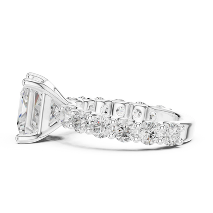 Side view of white gold princess cut solitaire ring with shared prong large stone band and elevated setting