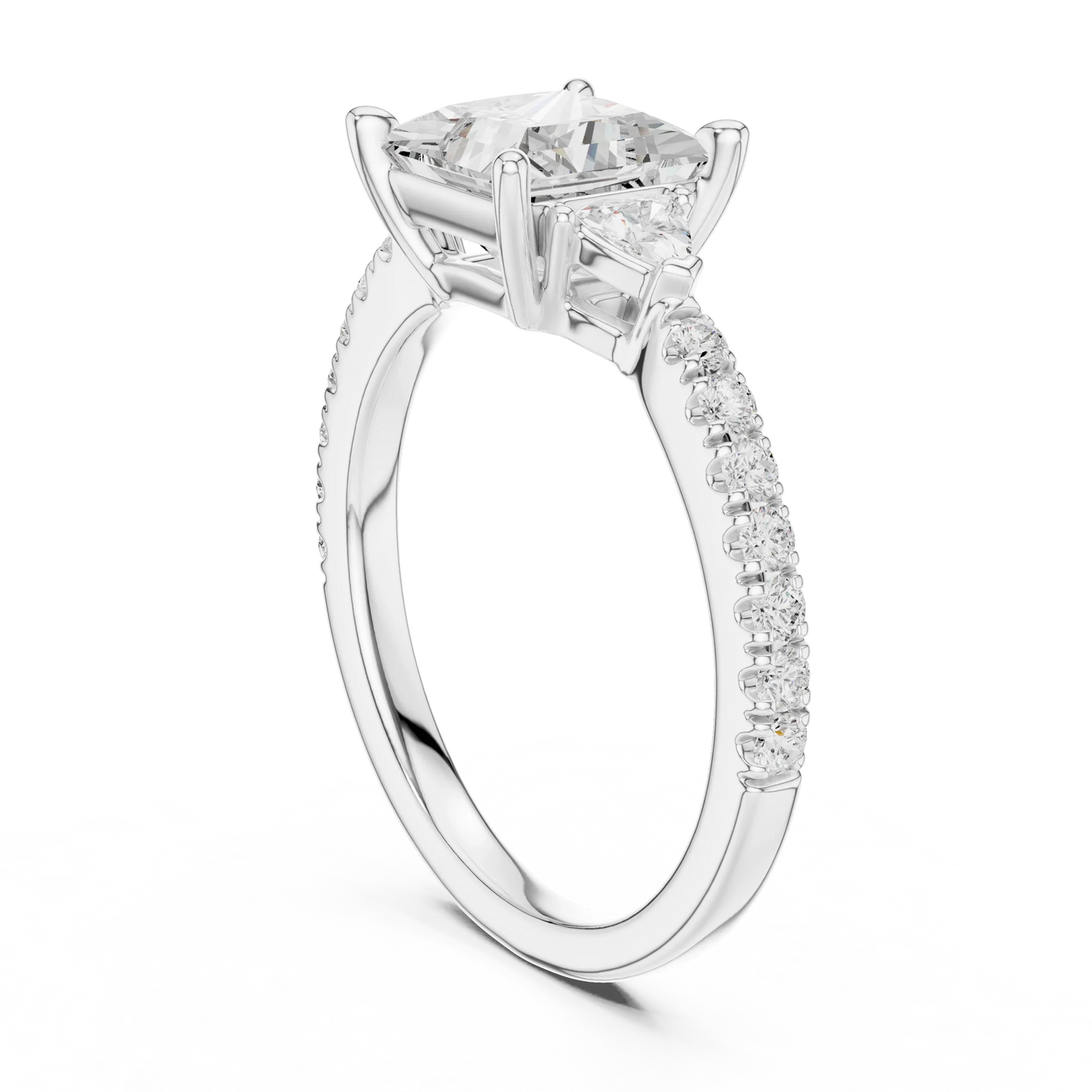 Back view of white gold princess three stone diamond ring with half moon side stones and pave band, showing band and setting.