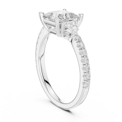 Back view of white gold princess three stone diamond ring with half moon side stones and pave band, showing band and setting.