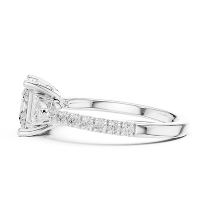 Side view of white gold princess three stone diamond ring with half moon side stones and pave band, highlighting setting profile.