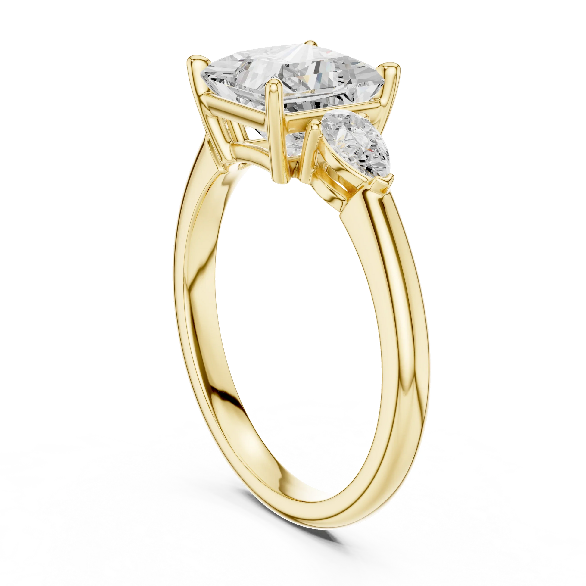 Back side view of yellow gold princess three-stone ring with pear side stones and lab-grown diamond 鈥?Australia