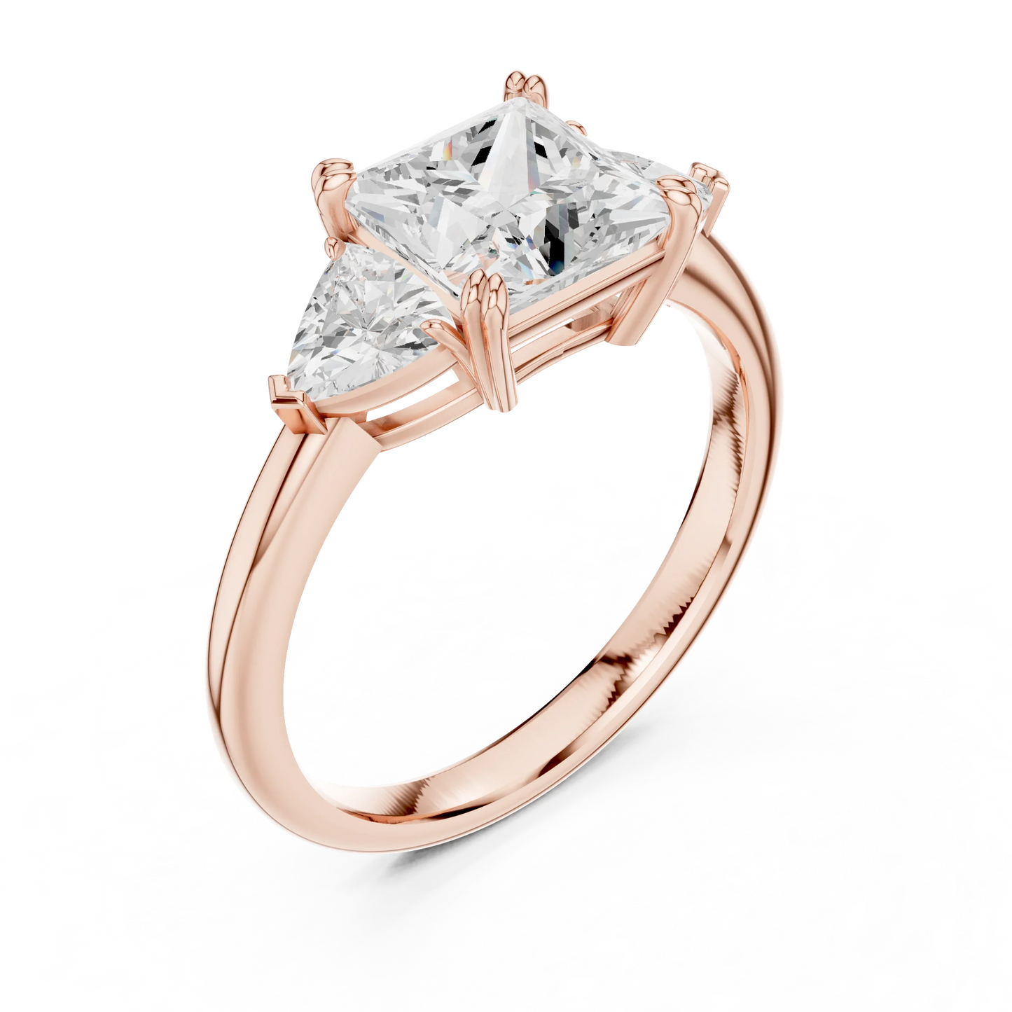 Front view of rose gold princess three-stone ring with trillion cut side stones and lab-grown diamond 鈥?Australia