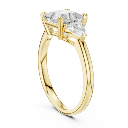 Back side view of yellow gold princess three-stone ring with trillion cut side stones and lab-grown diamond 鈥?Australia
