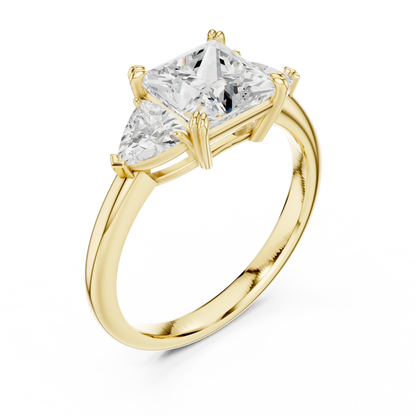 Front view of yellow gold princess three-stone ring with trillion cut side stones and lab-grown diamond 鈥?Australia