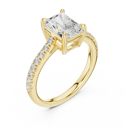 Front view of yellow gold radiant diamond pavé band ring