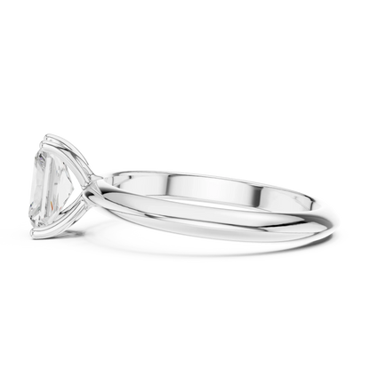 Side view of white gold radiant cut diamond solitaire ring, highlighting prong setting