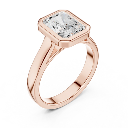 Front view of rose gold radiant full bezel solitaire ring with wide flat band and lab-grown diamond – Australia