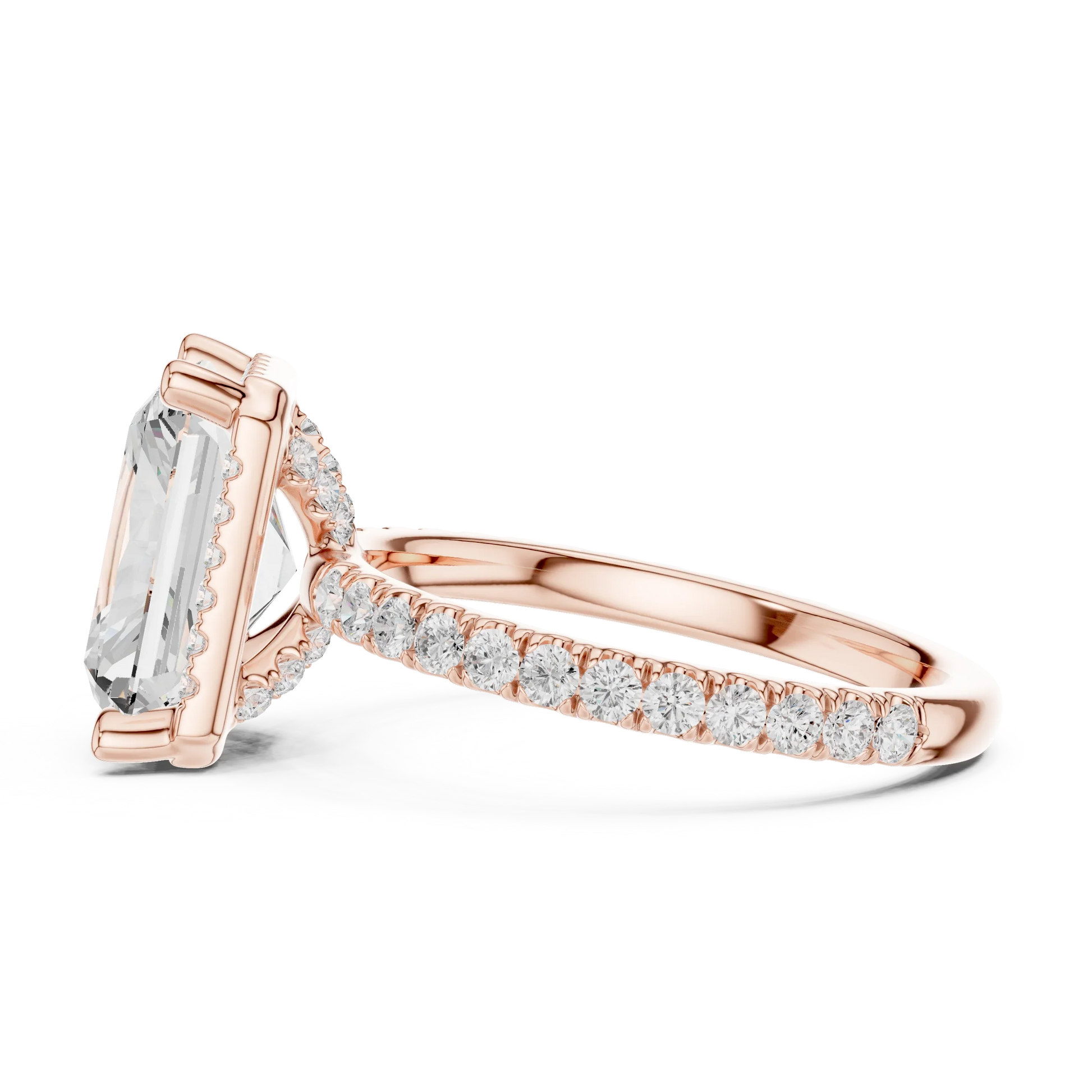 Side view of rose gold radiant cut micro halo ring highlighting pav茅 diamond band and halo profile